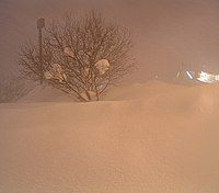 Fulton, New York, after a snowburst dropped 4–6 feet (122–183 cm) of snow over most of Oswego County January 28–31, 2004