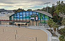 In the late fall of 2023, Cal Poly's Mott Athletics Center exterior was repainted adjacent to Swanson Beach Volleyball Complex.