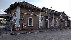 Two-story building with hip roof