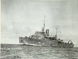 HMAS Geelong traveling at full speed while escorting a convoy off New Guinea in September 1944