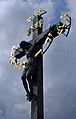 INRI plaque attached to Crucifix and Calvary statue on the north side of Charles Bridge, Prague