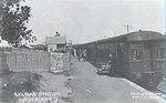 Sutherland Railway Station, view looking down platform with train waiting, ca. 1920s. This train was typical of the steam services on the line before electric services were introduced in 1926.