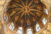 Dome of the Parecclesion interior at Chora Church showing ribs, frescos, and a drum with windows