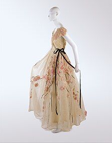 Romantic-style dress by Jeanne Lanvin made of cotton and silk, 1937.