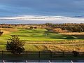 the 18th at Granville seen from the cluhouse at sunrise when the shadows play on the humps and hollows