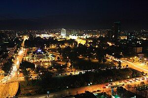 Skyline of Tirana by night looking over Rinia Park