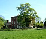 Walton Hall and attached stable range and garden wall