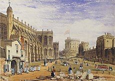 A painting showing a stone chapel on the left, with a timber built entrance, out of which are parading a number of white clad individuals. In the middle of the painting is a grassy area, across which are marching various red-uniformed soldiers. On the right hand side is a line of stone buildings, with a circular tower on a mound in the far distance.