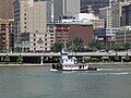 Boat operated by Consol Energy passing downtown Pittsburgh, PA.