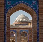 Stone tomb with a dome on stone pillars by the side Mirza Jani Baig's tomb