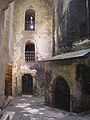 Inner ward of Pernštejn Castle with the entrance to Dracula's crypt in the movie on the right