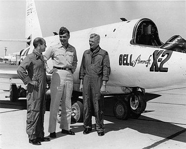 X-2 pilots Capt. Milburn "Mel" Apt and Capt. Iven Kincheloe flank Col. Horace Hanes, AFFTC flight test director