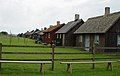 Area for drying nets behind one of the rows of cottages