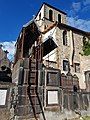 A grave with a ladder to climb on.