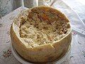 Casu martzu, a rotten cheese from Sardinia, Italy, is a traditional sheep milk cheese that contains live maggots as well as cheese mites.