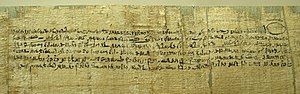 Contract in Demotic writing, with signature of a witness on the verso. Papyrus, Ptolemaic era.