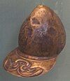 Bronze helmet with peak