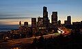 Image 2 Seattle, Washington Photo credit: Cacophony The skyline of Seattle, Washington at dusk, viewed from the south. The Columbia Center (middle) is the second tallest building on the West Coast of the United States, and the twelfth tallest in the United States. Smith Tower (left), completed 1914, was at one time the fourth tallest building in the world. The highway in the foreground is Interstate 5. More selected pictures