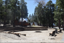 A picture of Buckhorn campgrounds campfire and cabin area