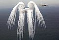 Wingtip vortices shown in flare smoke left behind a C-17 Globemaster III. Also known as smoke angels.