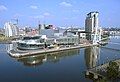 The Salford Quays, with the Lowry Centre arts complex in the centre.