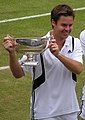 Image 56Todd Woodbridge holding the Gentlemen's doubles silver challenge cup in 2004 (from Wimbledon Championships)