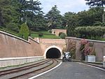 The tunnel to headshunt with parked tractor, looking north