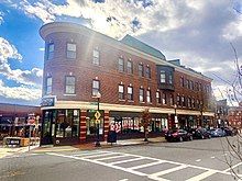 A portion of Roslindale Square on Belgrade Ave., directly across the street from the Roslindale Village Commuter Rail stop.