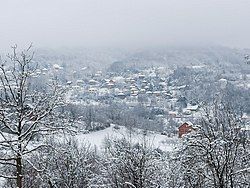 Panorama shot of the village of Velika Sejanica, covered with light snow