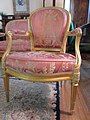 Cabriolet armchair (c. 1775, France), one of four made by Georges Jacob.