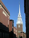 Old North Church in the North End and red brick buildings typical of the neighborhood