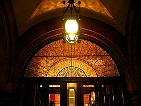 Lantern of the porch and the leaded glass fanlight.