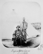 Formal outdoor photo of two men, one older than the other