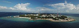 Aerial view of the whole of Villimalé with Malé in the background,