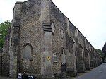 Augustinian priory, later abbey and associated pillow mound, at King's School