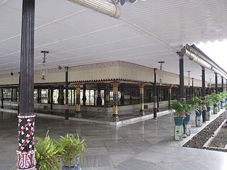 Corner of palace, with marble floor and plants