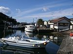 Small boats and houses.