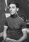 Seated man in cycling uniform