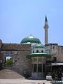 Entrance to the mosque, with the sabil to the right of the steps.