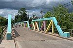 Pony truss bridge of reinforced concrete