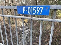 Sign on Bridge reinforced concrete girder bridge panel P-01597 (1951),[2] chemin des Moulins