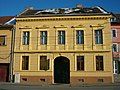 Neoclassical building with eyes (Sibiu)