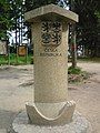 Border stone on the tripoint of the Czech Republic (foreground), Austria, and Germany