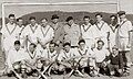 The St George District Hockey Club, Sydney, team in Lithgow, Australia, in July 1954. Standing: Captain of the team, Olympian Richard John Carr (Dick Carr), fifth from left; President of the New South Wales Hockey Association and the Australian Hockey Association, Dr Fraser, sixth from left. Sitting: Joe Crepp (goalkeeper), sixth from left; Jo Crepp's son Peter Crepp, extreme right. (Courtesy: Members of St George District Hockey Club, Sydney, Australia)[1]