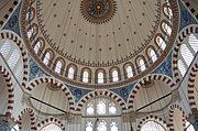 The small Rüstem Pasha Mosque (1561) is an early example of Sinan's use of an octagonal support system.[103]