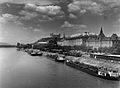 Historical photograph of the riverfront showing its industrial heritage