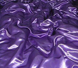 If a fabric is formed with a satin weave using filament fibres such as silk, polyester or nylon, the corresponding fabric is termed a 'satin', although some definitions insist that a satin fabric is only made from silk. If the yarns used are short-staple yarns such as cotton, the fabric formed is considered a sateen.