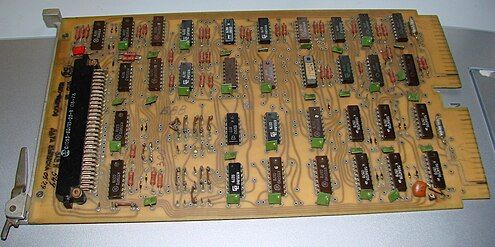 1970s I1 parallel interface board for Electronika 60. The green rectangular parts are decoupling capacitors.