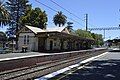 Northbound view from the former ground level Platform 2 viewing the station building, December 2013, prior to grade separation works