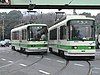 Two Tokyo Toden trams meet in 2002